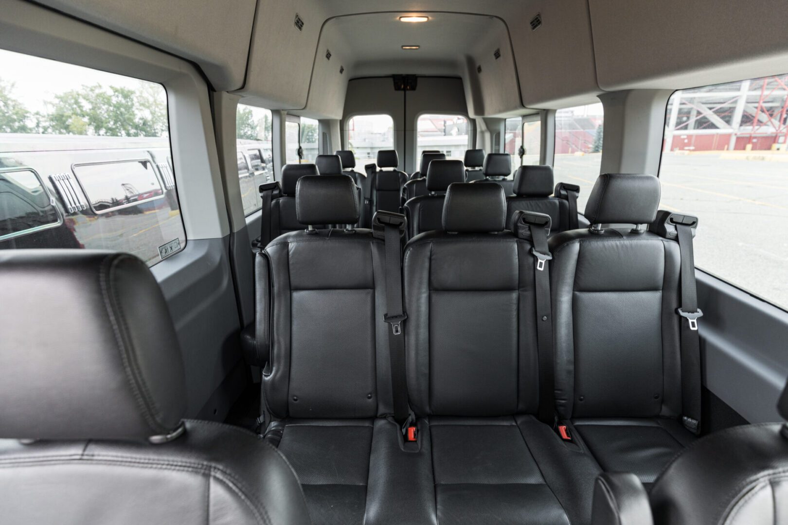 Interior of a Ford Transit van with black leather seats