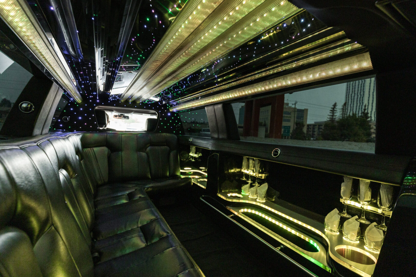A limo is shown with lights on the ceiling.