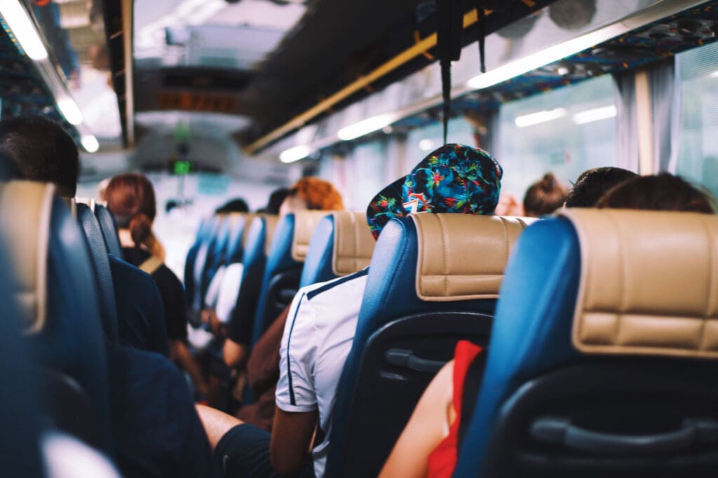 Passengers seated comfortably in a group shuttle bus